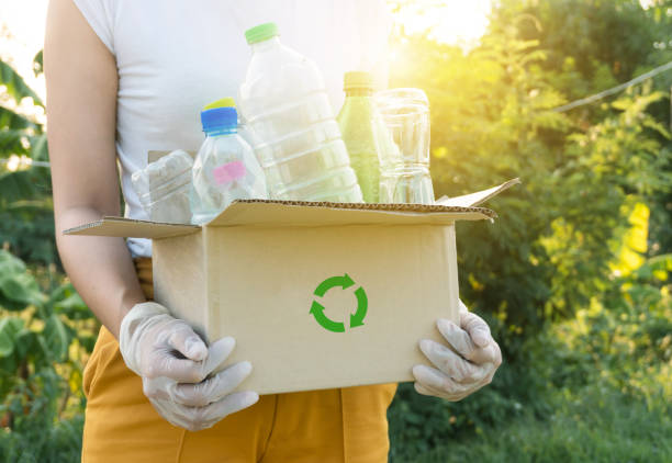 istock plastic bottles into a box for recycling concept 1224503753