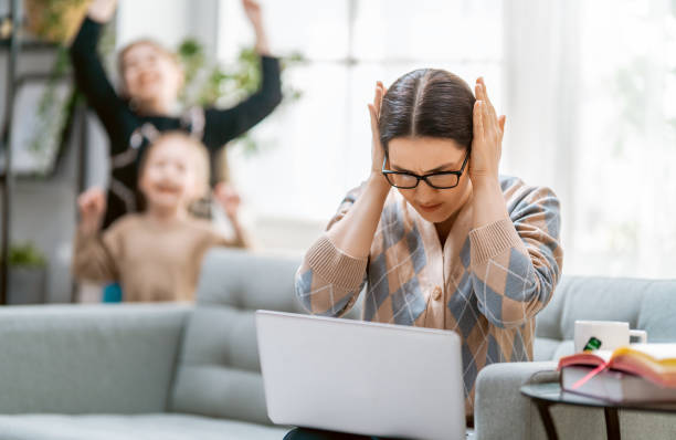 istock woman working on a laptop at home. 1224505008