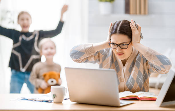 istock woman working on a laptop at home. 1224505387