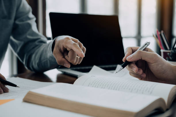 istock Teenager studying at desk and doing homeworks 1224505798