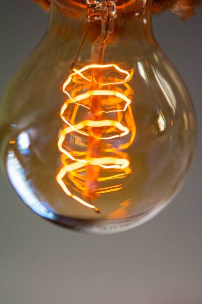 istock filament glowing in a light bulb 1224507874
