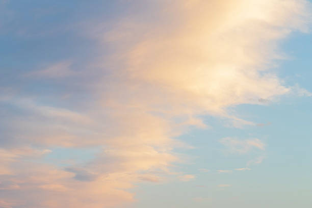 istock Blue sky with red golden and white clouds. Sunset sun 1224510390
