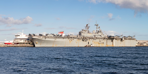 Melbourne, Australia - August 30, 2017: USS Bonhomme Richard (LHD-6) Wasp-class amphibious assault ship of the United States Navy docked at Station Pier in Melbourne Australia with Helicopters from the United States Marine Corps on the deck.
