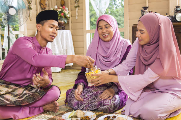 istock Muslim family feasting during the Eid celebration 1224511549