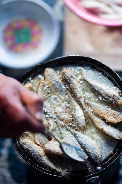 istock Frying small sardines fish, Chefchouen, Morocco 1224512679