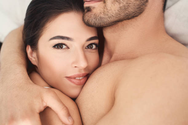 istock Serene woman resting on a mans chest 1224513649