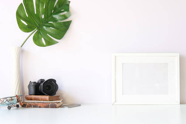 istock Mockup workspace desk and copy space books,plant and coffee on white desk. 1224513971