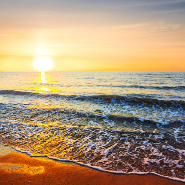 istock sunset over a quiet sea 1224515119