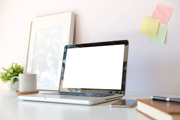 istock Workspace desk and laptop. copy space and blank screen. Business image, Blank screen laptop and supplies. 1224516710