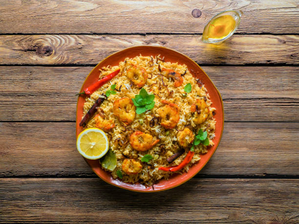 istock Biryani with shrimp. Tasty and delicious prawns biryani, top view 1224517543