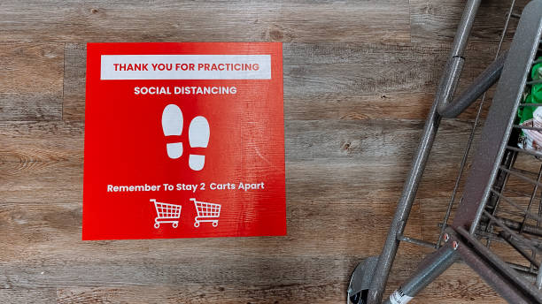 istock Social distancing sign on the floor 1224517757