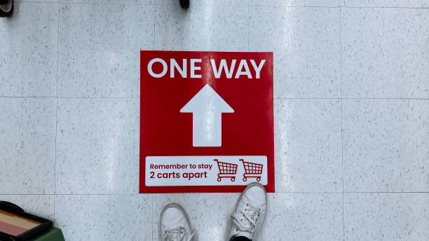 istock Social distancing sign on the floor 1224517772