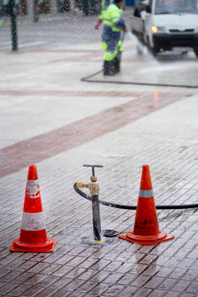 istock Public janitor deep cleaning the sidewalk 1224520886