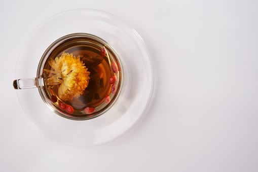 hot chinese flower tea on white background