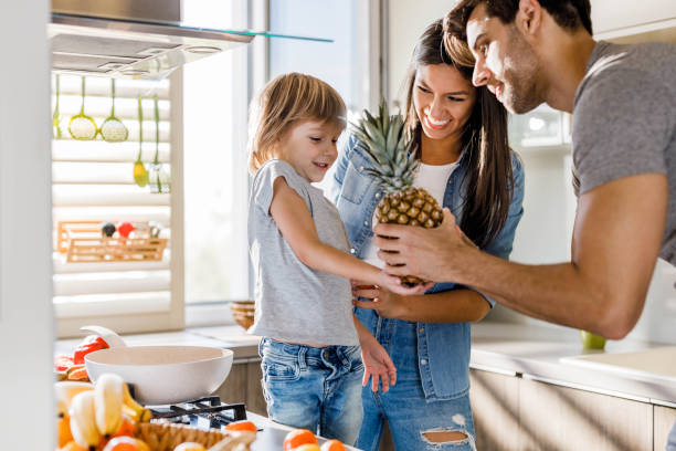 istock Here's a pineapple for you son! 1224522902