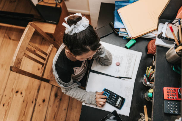 istock little girl doing homeschooling in mathematics 1224524705