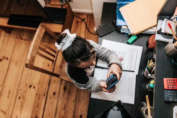 istock little girl doing homeschooling in mathematics 1224524724