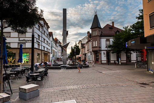 Singen, Germany - 3 August, 2019: color image depicting the city streets in the evening of Singen, an industrial city situated in the very south of Baden-Württemberg in Germany close to Lake Constance just north of the German-Swiss border and is the most important city in the Hegau area.