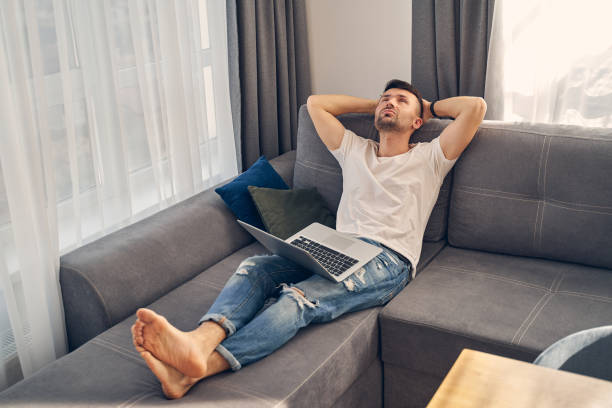 istock Handsome stylish male lying on the coach 1224527124