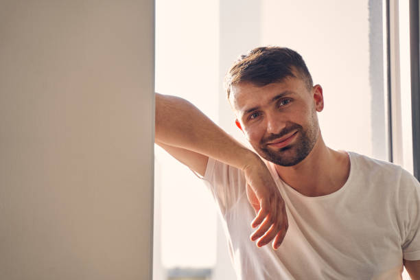 istock Handsome Caucasian man smiling in camera inside his home 1224527138