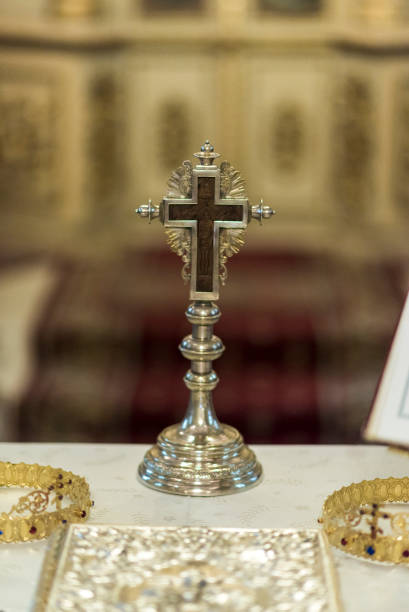 istock Beautiful cross inside romanian church at wedding time 1224529806