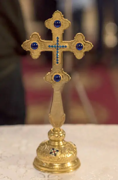 Photo of Beautiful cross inside romanian church at wedding time