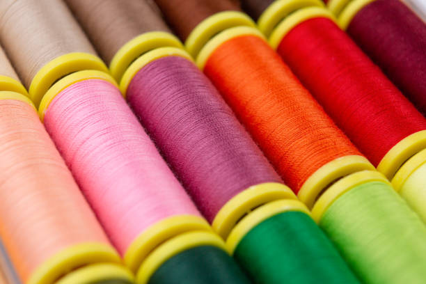 istock Sewing threads of many colors seen from close up 1224537714