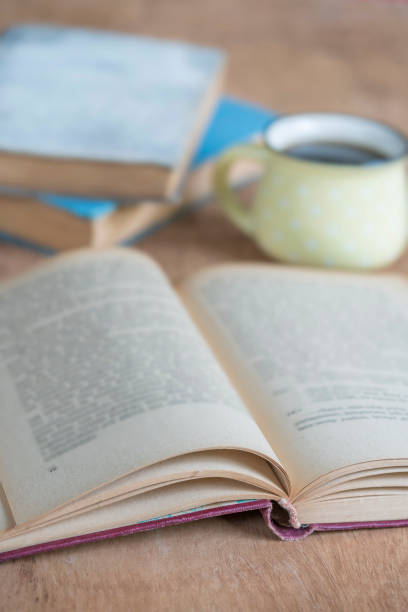istock coffee and old books on a wooden table with copy space 1224538625