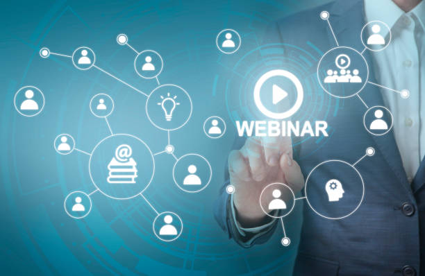 istock Collage with glowing educational network icons and businessman pushing word WEBINAR on transparent screen 1224539718