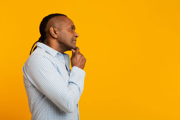istock Thoughtful middle aged african american man profile portrait 1224540145
