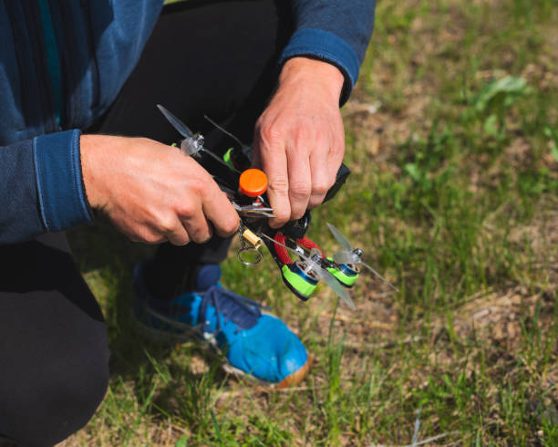 istock racing quadrocopter drone in human hands 1224542937