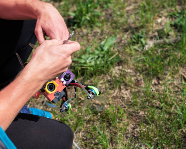 istock racing quadrocopter drone in human hands 1224542981