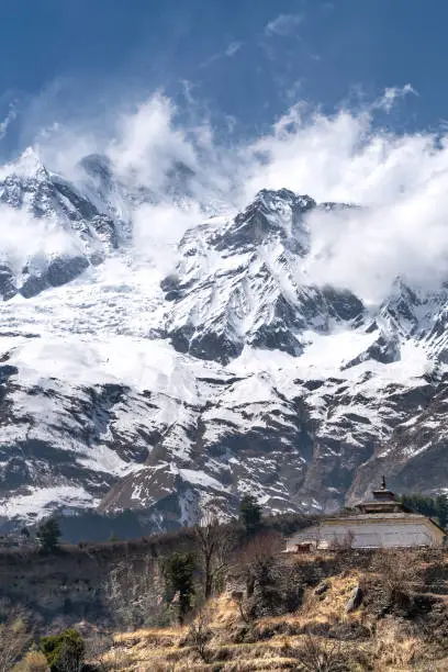 Photo of The view on Dhaulagiri peak and buddhist monastery