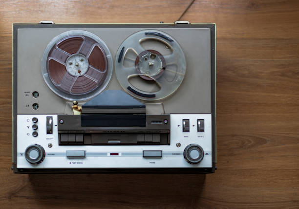 istock start of old tape recorder, play, pause, rewind, man playing 1224544086