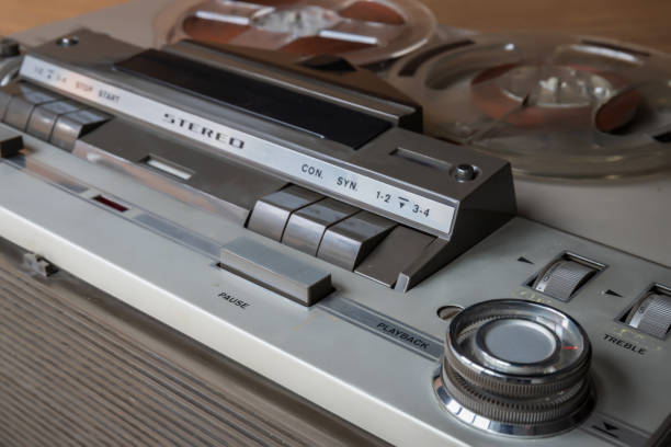 istock start of old tape recorder, play, pause, rewind, man playing 1224544089