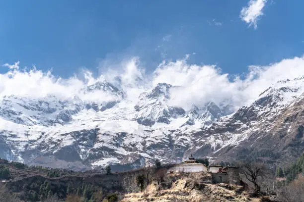 Photo of The view on Dhaulagiri peak and buddhist monastery