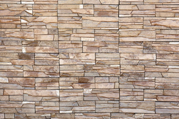 istock The wall is decorated with beige stone 1224545460