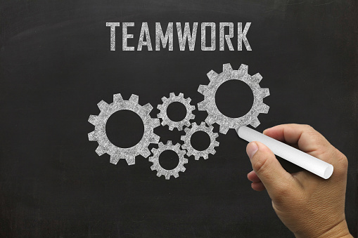 Teamwork cogwheel cooperation