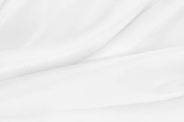 istock White fabric cloth texture for background and design art work, beautiful crumpled pattern of silk or linen. 1224547220