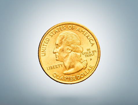 United States Quarter dollar coin made of gold and text: In gold we trust  instead of In God we trust depicting the gold standard