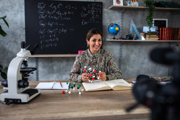 istock Woman recording educational lesson form home classroom 1224552676