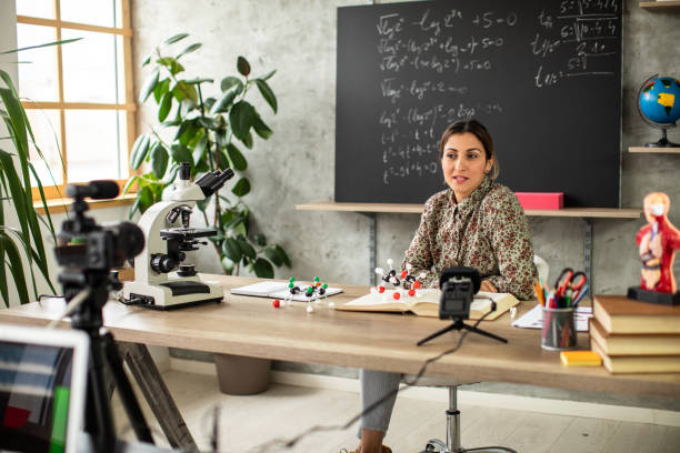 istock Woman recording educational lesson form home classroom 1224552779