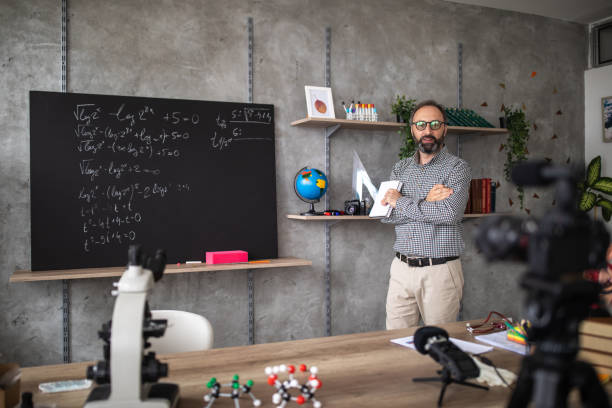 istock Teacher schooling kids online from home classroom 1224552920