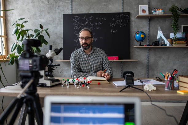 istock Teacher schooling kids online from home classroom 1224553175