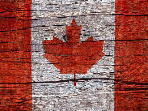 Canadian Flag. Beautiful greeting card. Close-up, view from above. National holiday concept. Congratulations for family, relatives, friends and colleagues