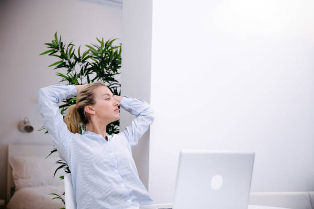 istock Young blonde woman working with computer at home. 1224556015