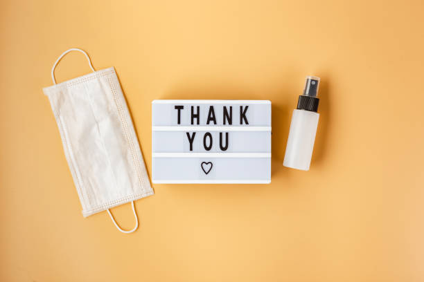 istock Lightbox, medicine mask and bottle with sanitaizer. 1224556433