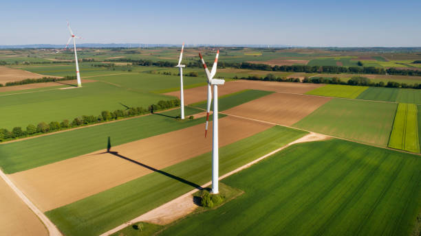 istock Wind turbines, agricultural area - aerial view 1224556962