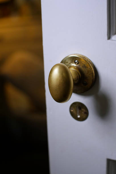 istock Open door leading to an ominous dark room. 1224559895