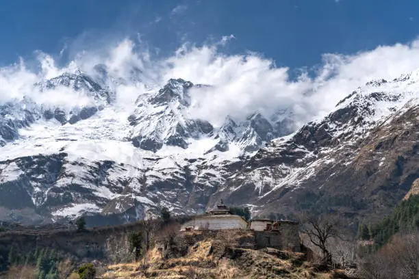 Photo of The view on Dhaulagiri peak and buddhist monastery